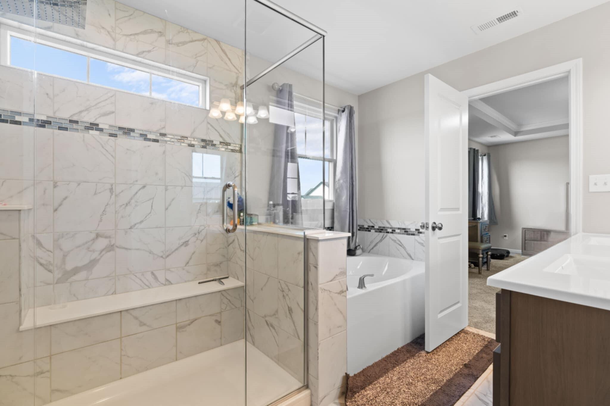 9872 Sumter Court Cedar Lake, IN 46303 - Photo 12 of 18 a bathroom with a tub sink and mirror