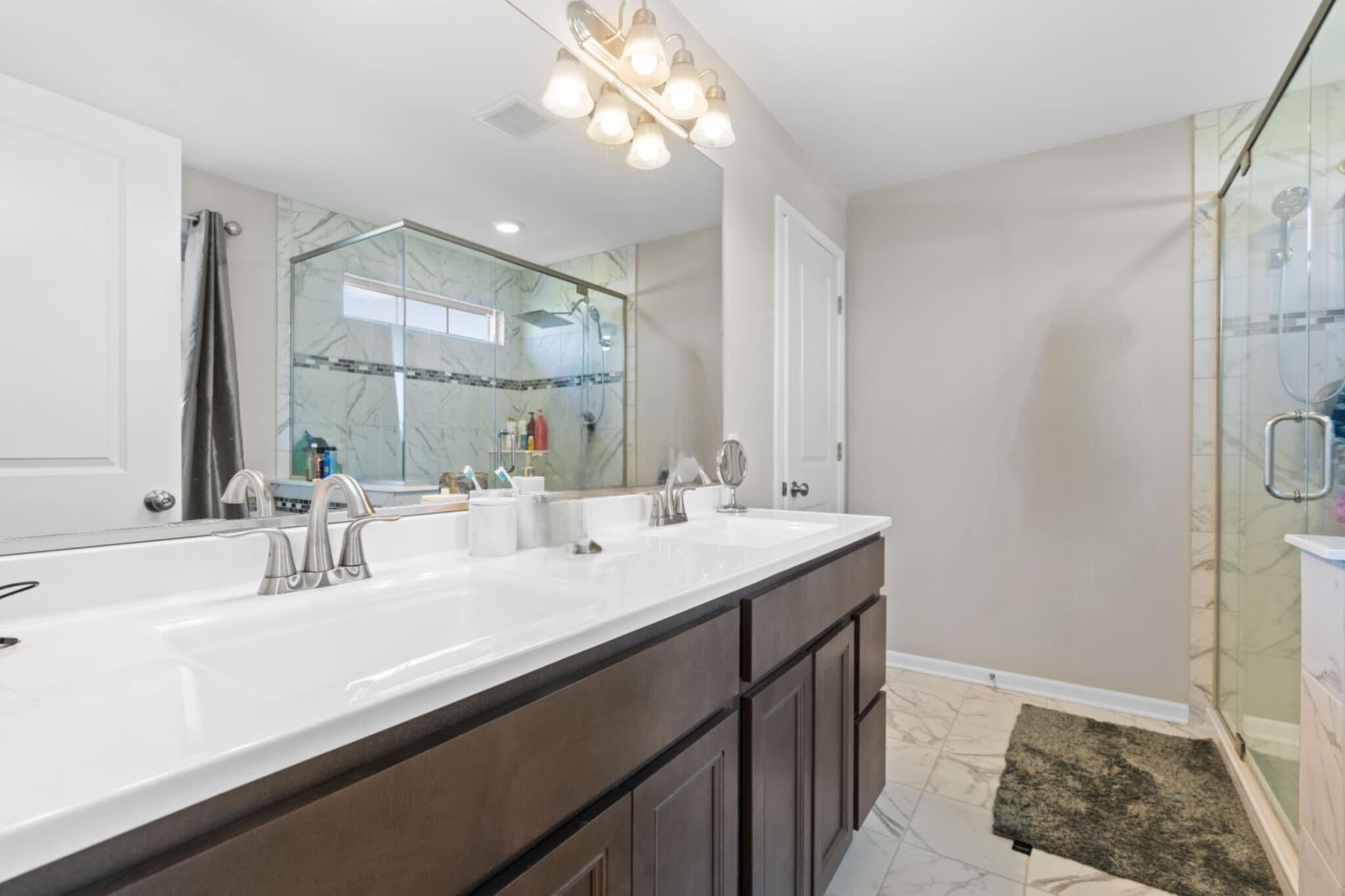 9872 Sumter Court Cedar Lake, IN 46303 - Photo 13 of 18 a bathroom with a sink and a mirror