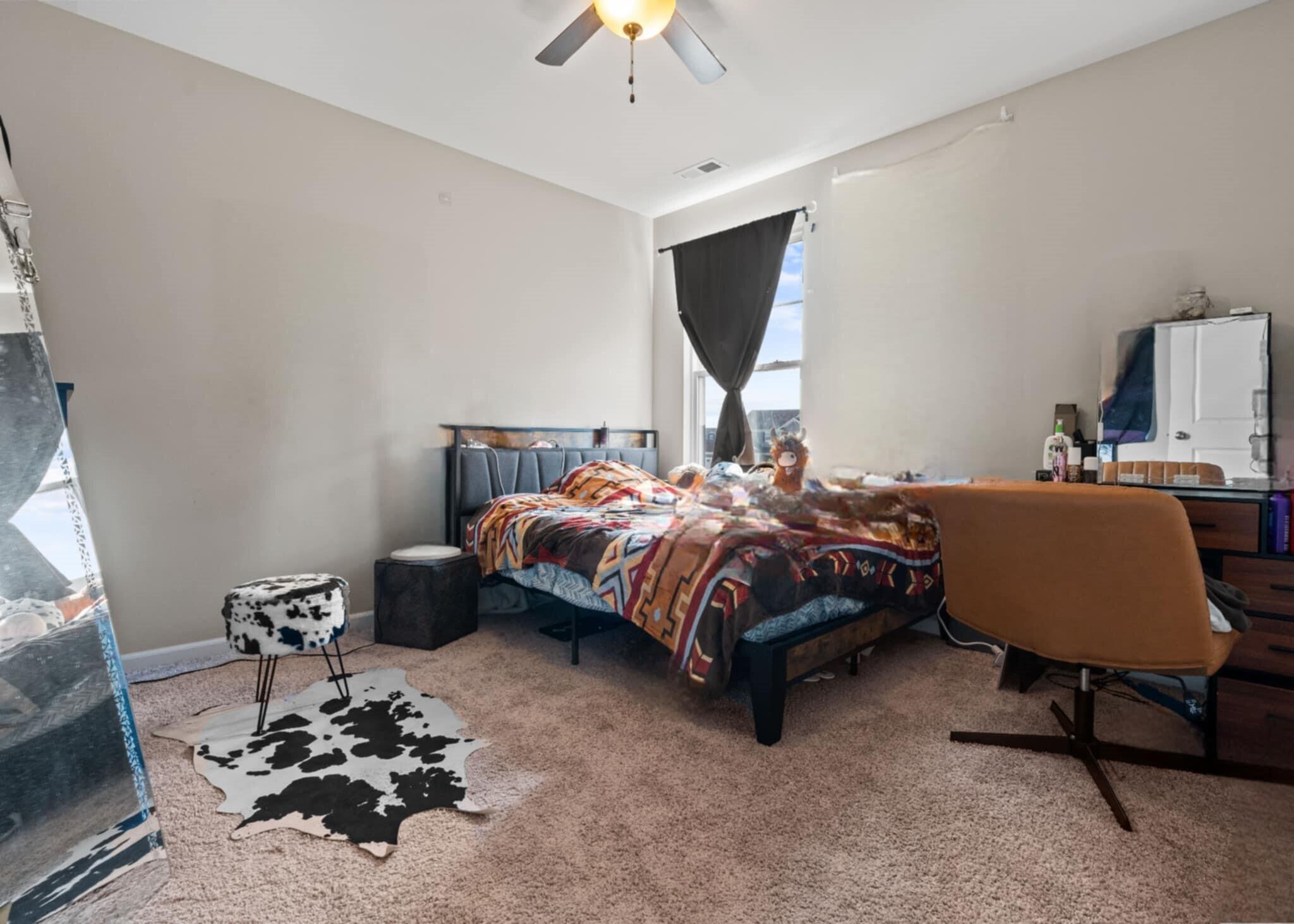 9872 Sumter Court Cedar Lake, IN 46303 - Photo 16 of 18 a bedroom with a bed and a chandelier