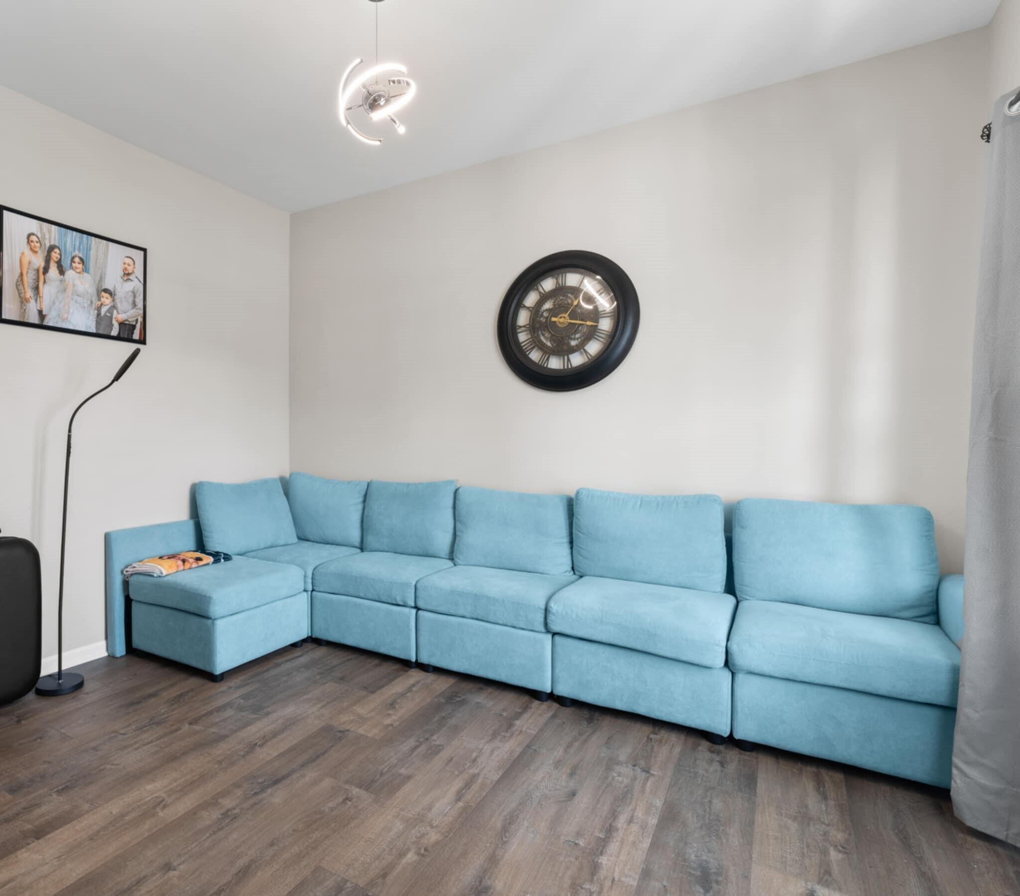 9872 Sumter Court Cedar Lake, IN 46303 - Photo 8 of 18 a living room with furniture a couch and a wall painting