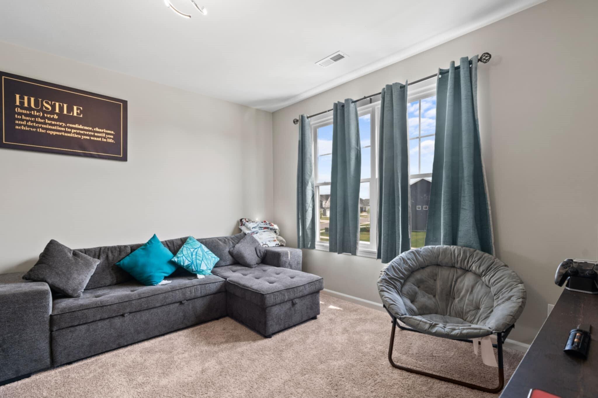 9872 Sumter Court Cedar Lake, IN 46303 - Photo 10 of 18 a living room with furniture and a large window