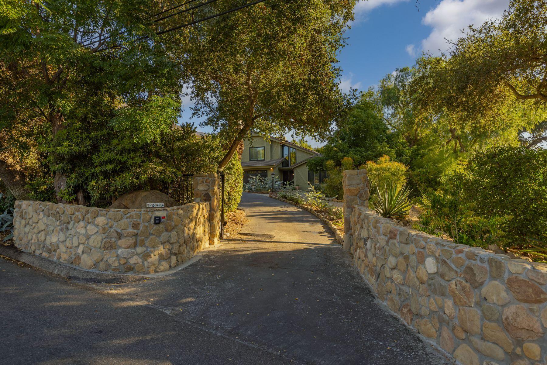 1270 Foothill Road Ojai, CA 93023 - Photo 1 of 47 a view of a house with large trees