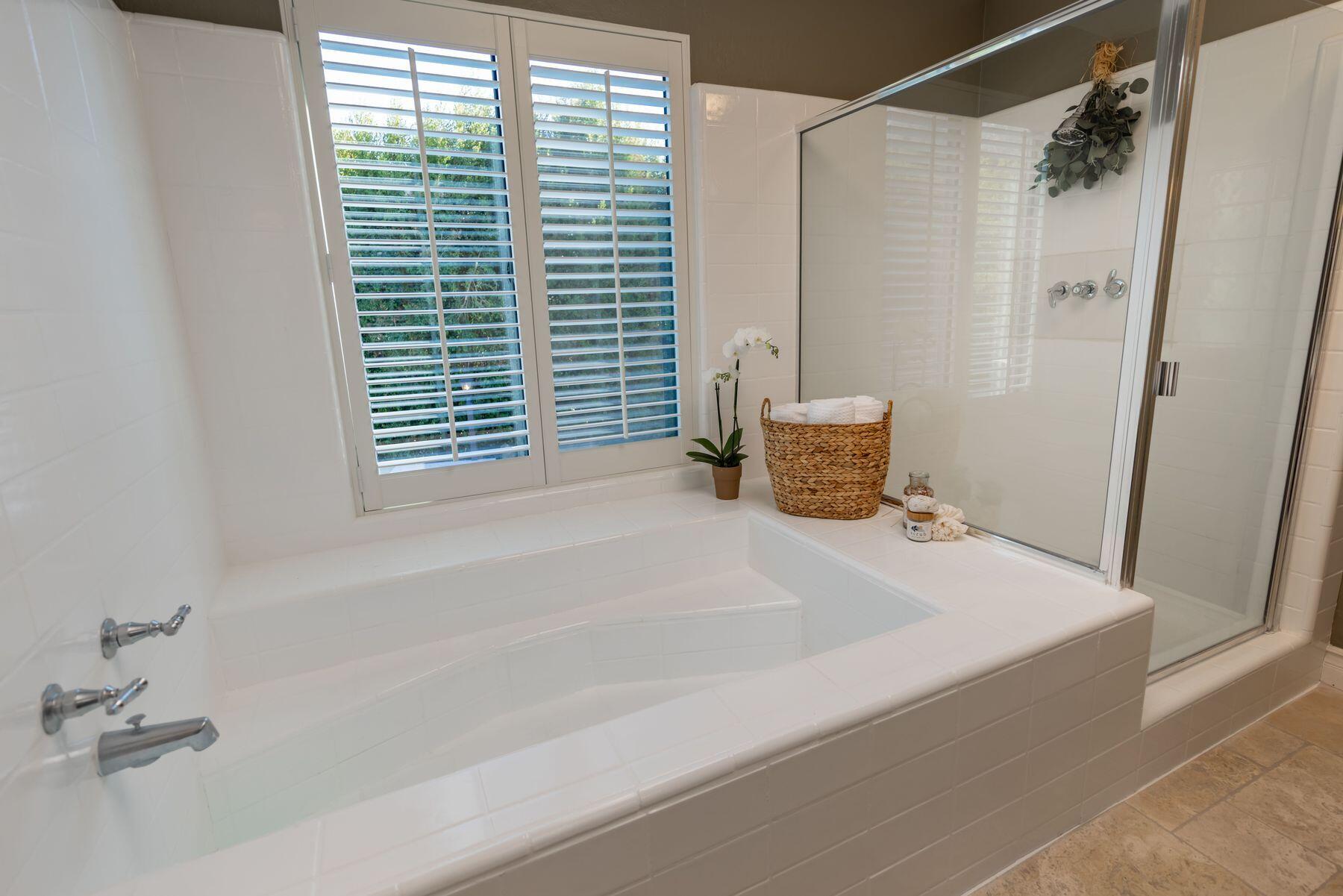1270 Foothill Road Ojai, CA 93023 - Photo 23 of 47 a bathroom with a bathtub and shower