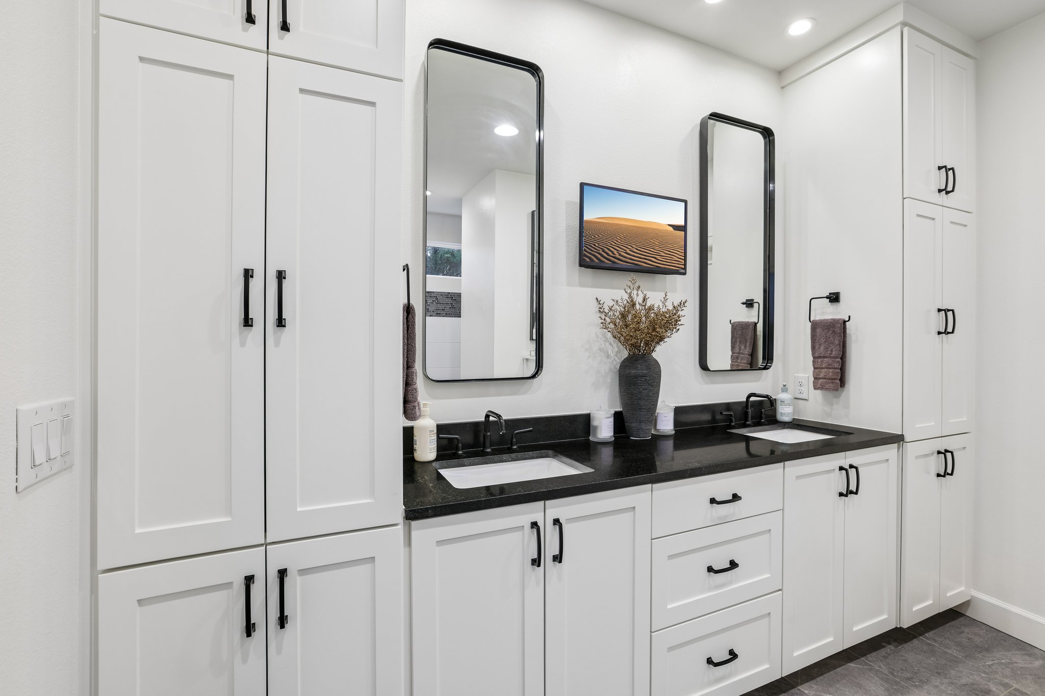 113 Crystal Lane Georgetown, TX 78633 - Photo 8 of 32 Ample storage solutions and dual vanity sinks define this elegant, modern primary bathroom.