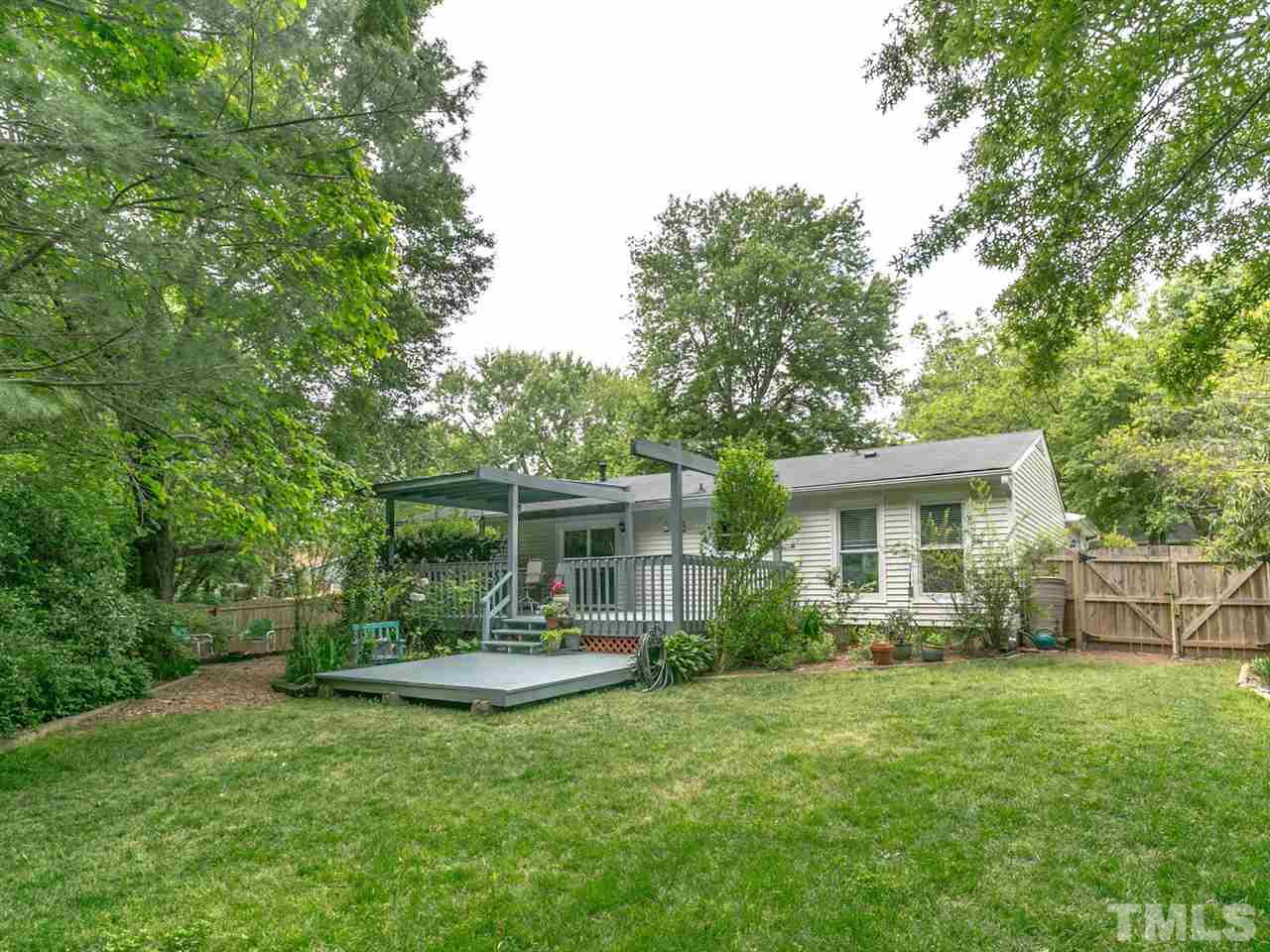 3116 Chancery Place Raleigh, NC 27607 - Photo 3 of 25 Large flat backyard with mature garden areas and plenty of privacy