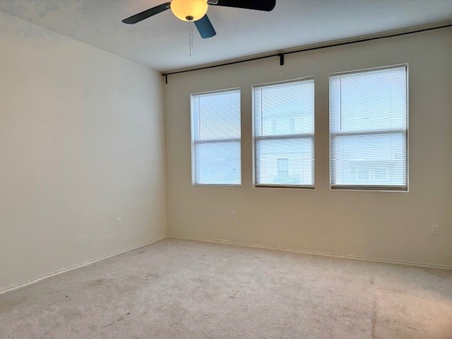 2015 Crimson Rosella Trail Austin, TX 78728 - Photo 17 of 20 Carpeted spare room with ceiling fan
