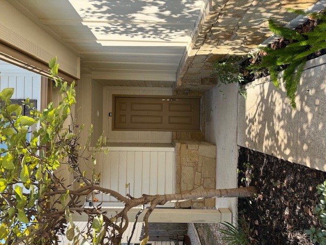 2015 Crimson Rosella Trail Austin, TX 78728 - Photo 3 of 20 Entrance to property with stone siding