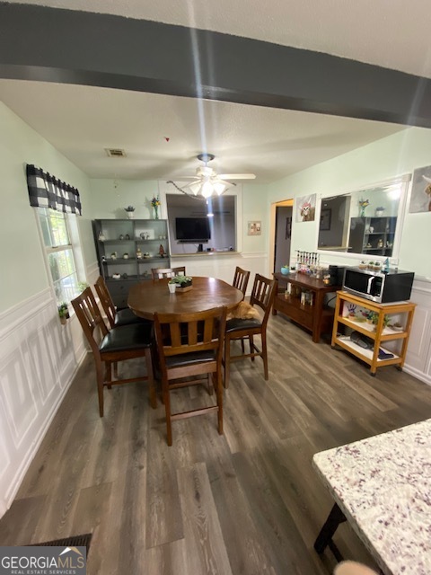 1102 Williams Lane Elberton, GA 30635 - Photo 12 of 36 a living room with furniture a flat screen tv and kitchen view