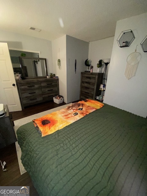 1102 Williams Lane Elberton, GA 30635 - Photo 16 of 36 a bedroom with a bed and dresser