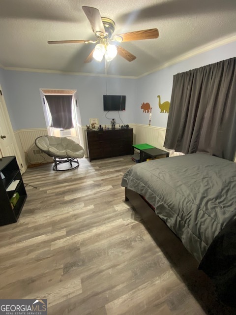 1102 Williams Lane Elberton, GA 30635 - Photo 24 of 36 a bedroom with double bed and a chandelier