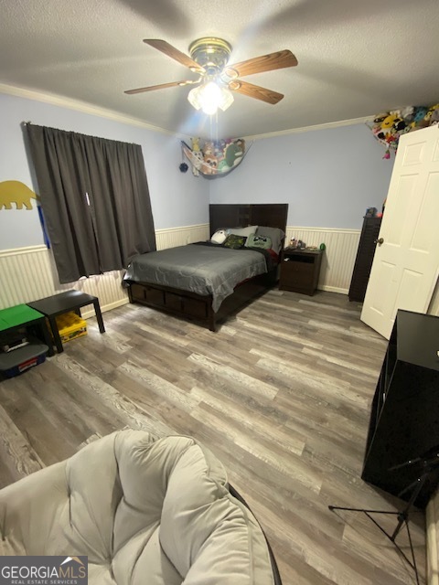 1102 Williams Lane Elberton, GA 30635 - Photo 25 of 36 a bedroom with a bed and a chandelier