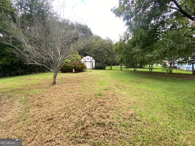 1102 Williams Lane Elberton, GA 30635 - Photo 28 of 36 a view of a swimming pool and trees in the background