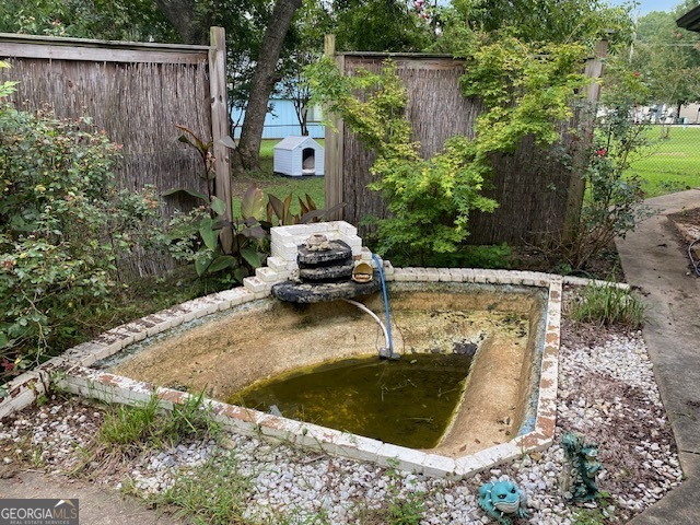 1102 Williams Lane Elberton, GA 30635 - Photo 34 of 36 a small pool with some trees in the background