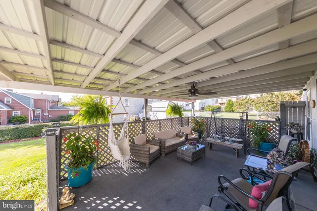 a view of a car park in front of house