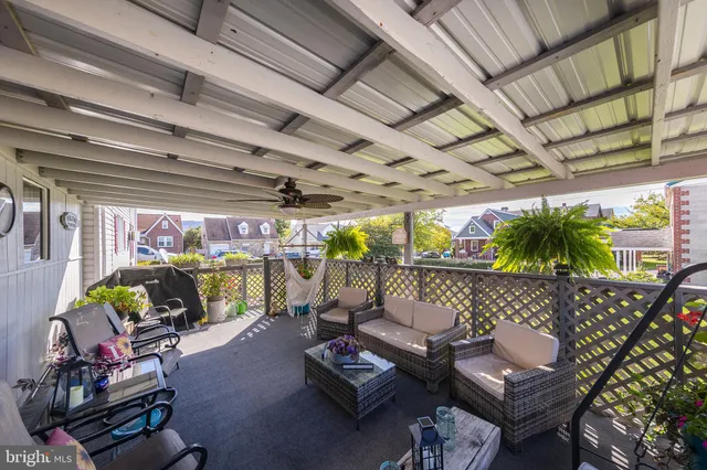 a view of a house with a flat space and a fireplace