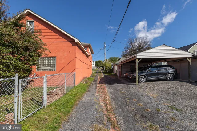 a house with trees in front of it