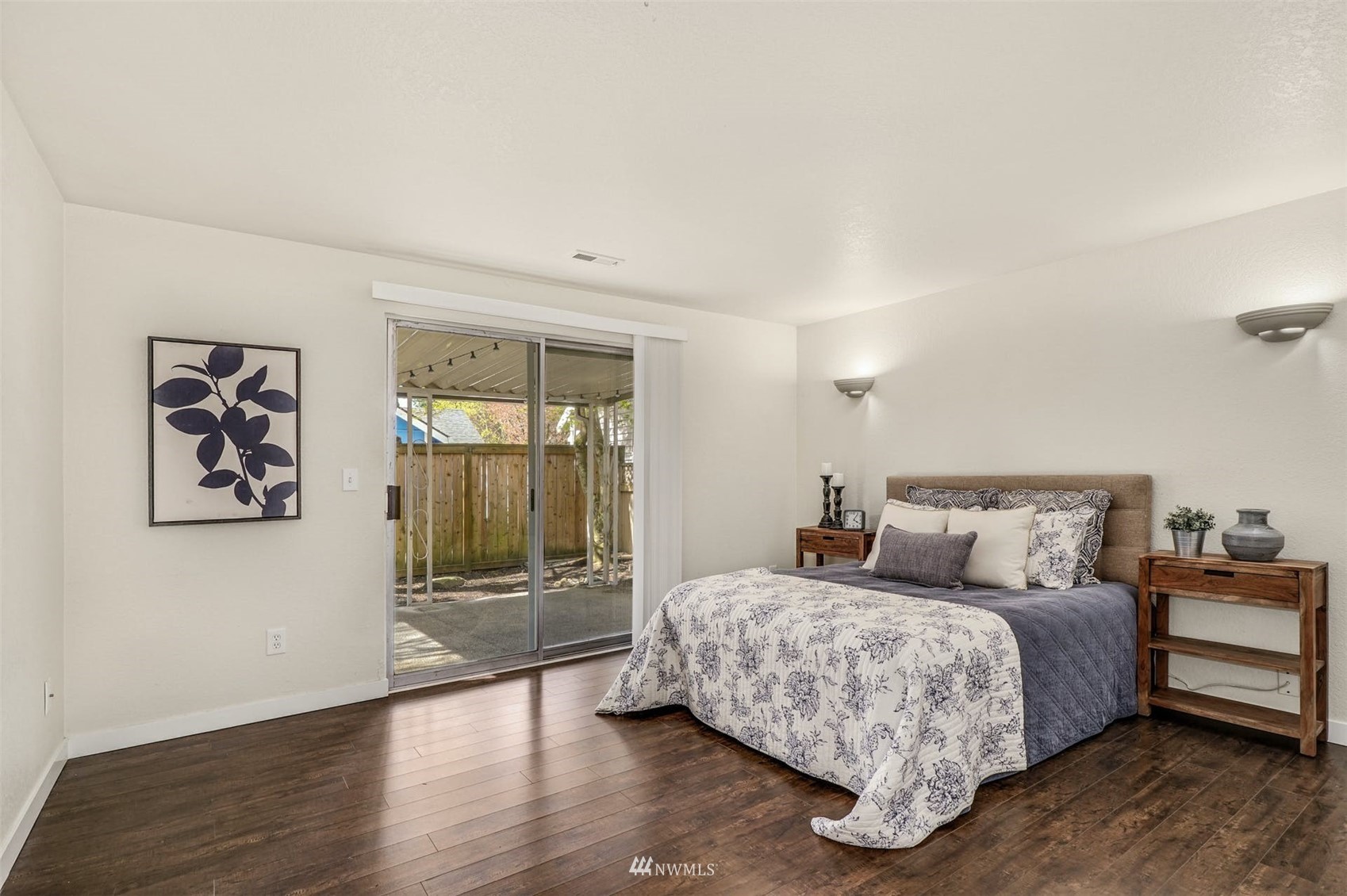 9103 183rd Avenue Northeast Redmond, WA 98052 - Photo 12 of 25 a bedroom with double bed and a window