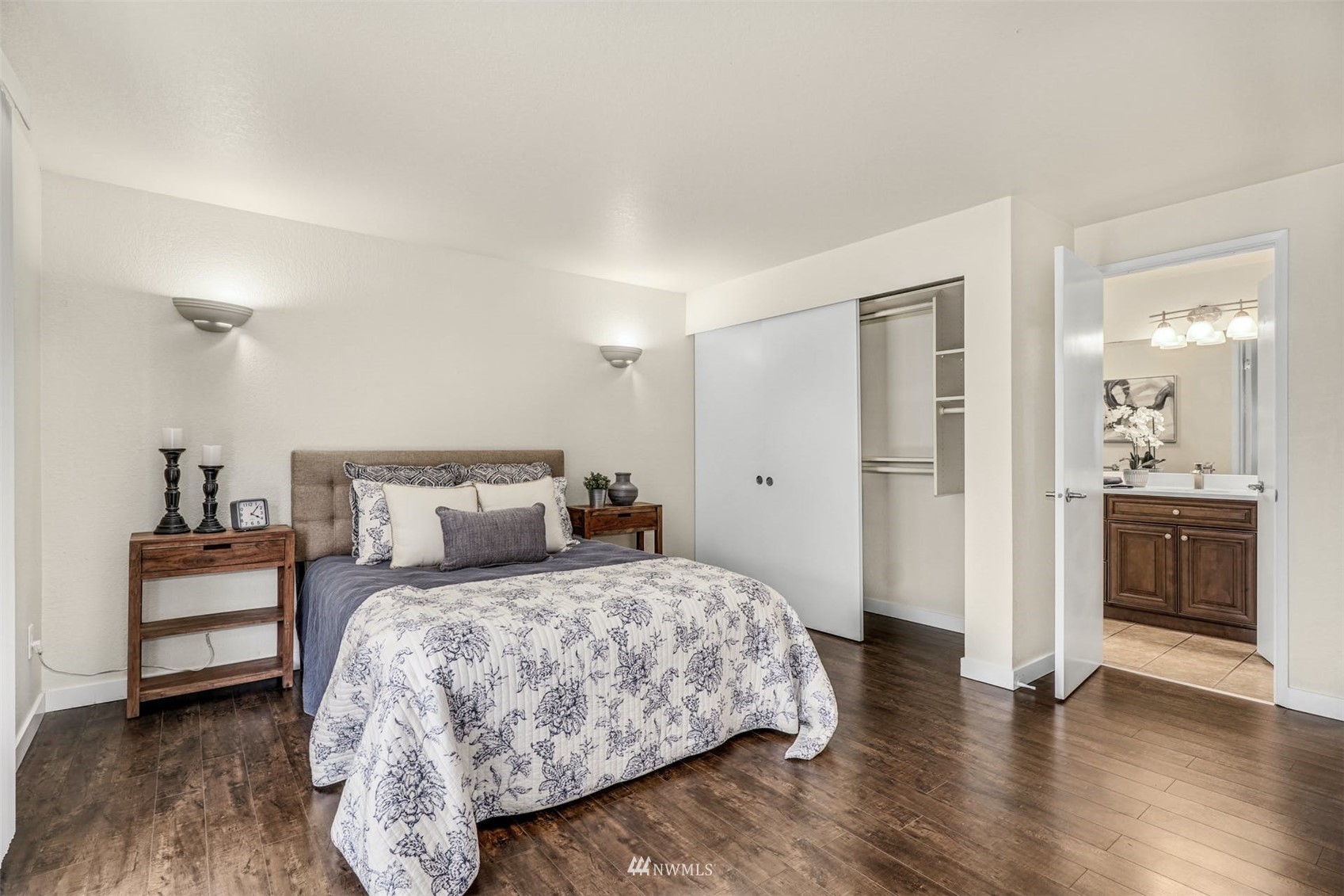 9103 183rd Avenue Northeast Redmond, WA 98052 - Photo 13 of 25 a bedroom with a bed and a view of bathroom