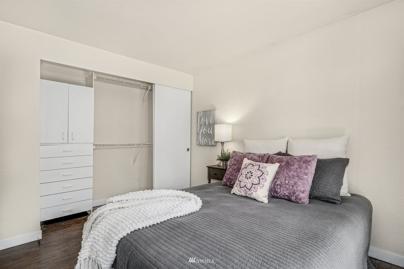 9103 183rd Avenue Northeast Redmond, WA 98052 - Photo 16 of 25 a bedroom with a bed and a closet