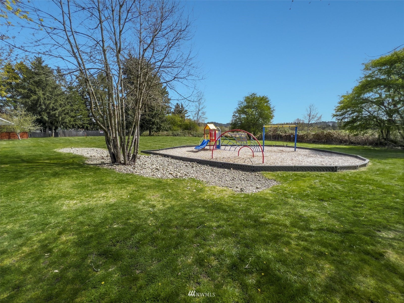 9103 183rd Avenue Northeast Redmond, WA 98052 - Photo 21 of 25 a view of a house with a yard