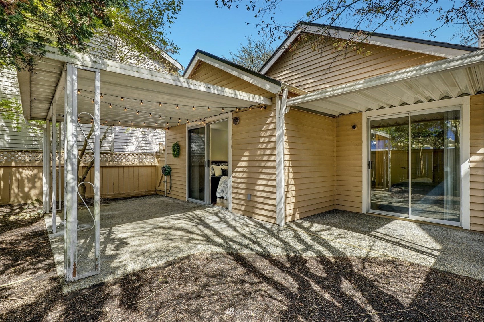 9103 183rd Avenue Northeast Redmond, WA 98052 - Photo 25 of 25 a view of a house with a outdoor space