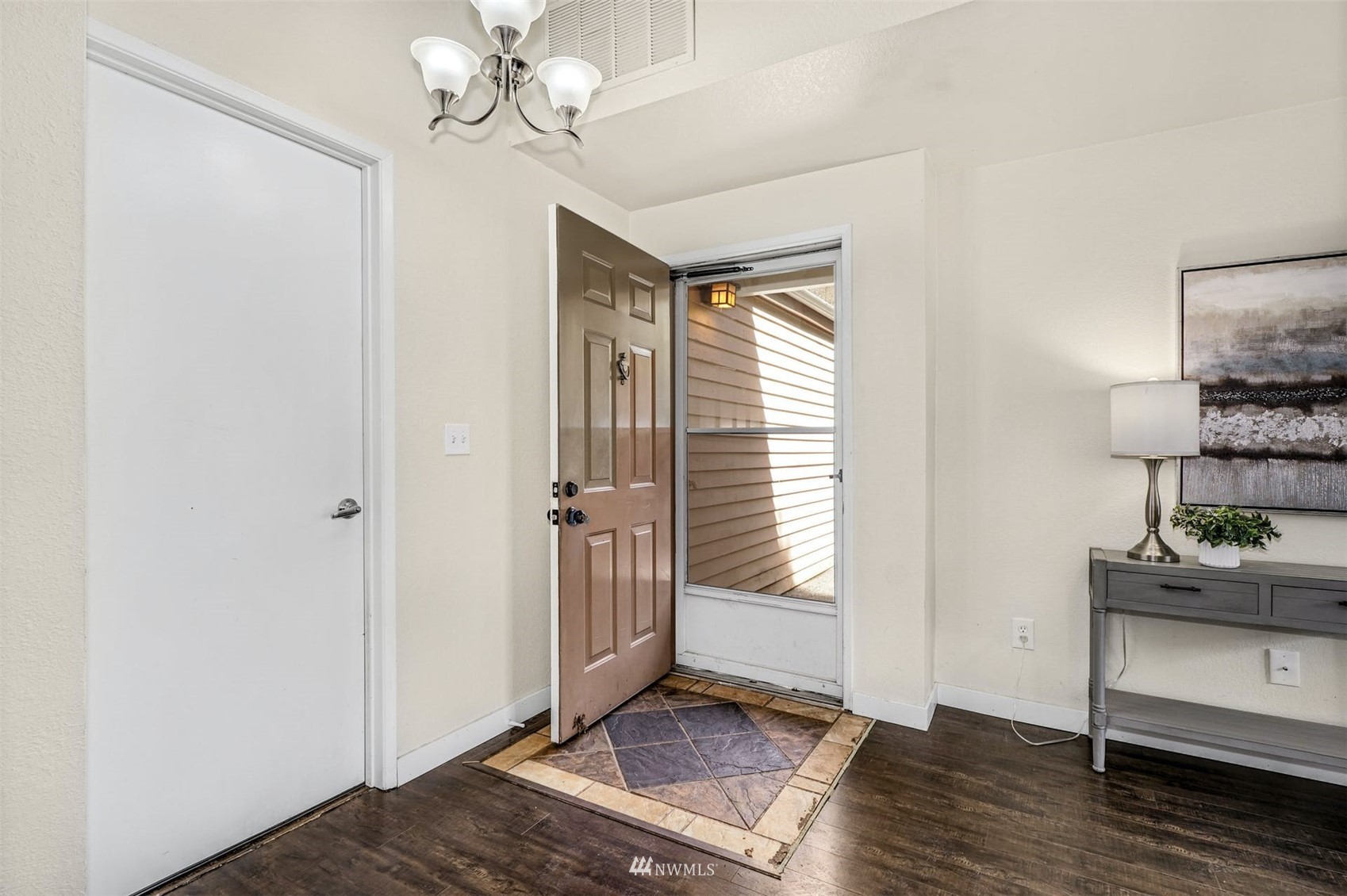 9103 183rd Avenue Northeast Redmond, WA 98052 - Photo 3 of 25 a view of an entryway with wooden floor