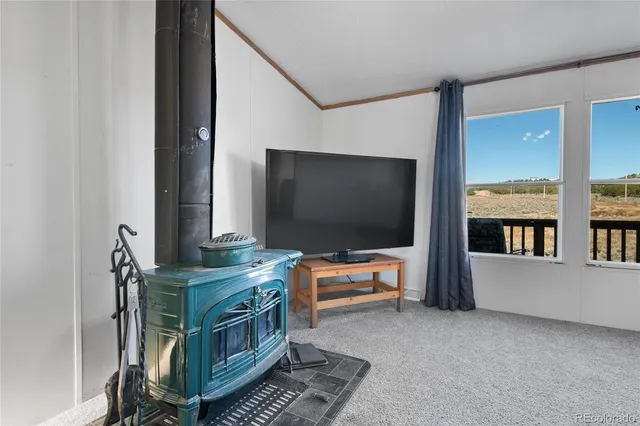 a view of a livingroom with furniture