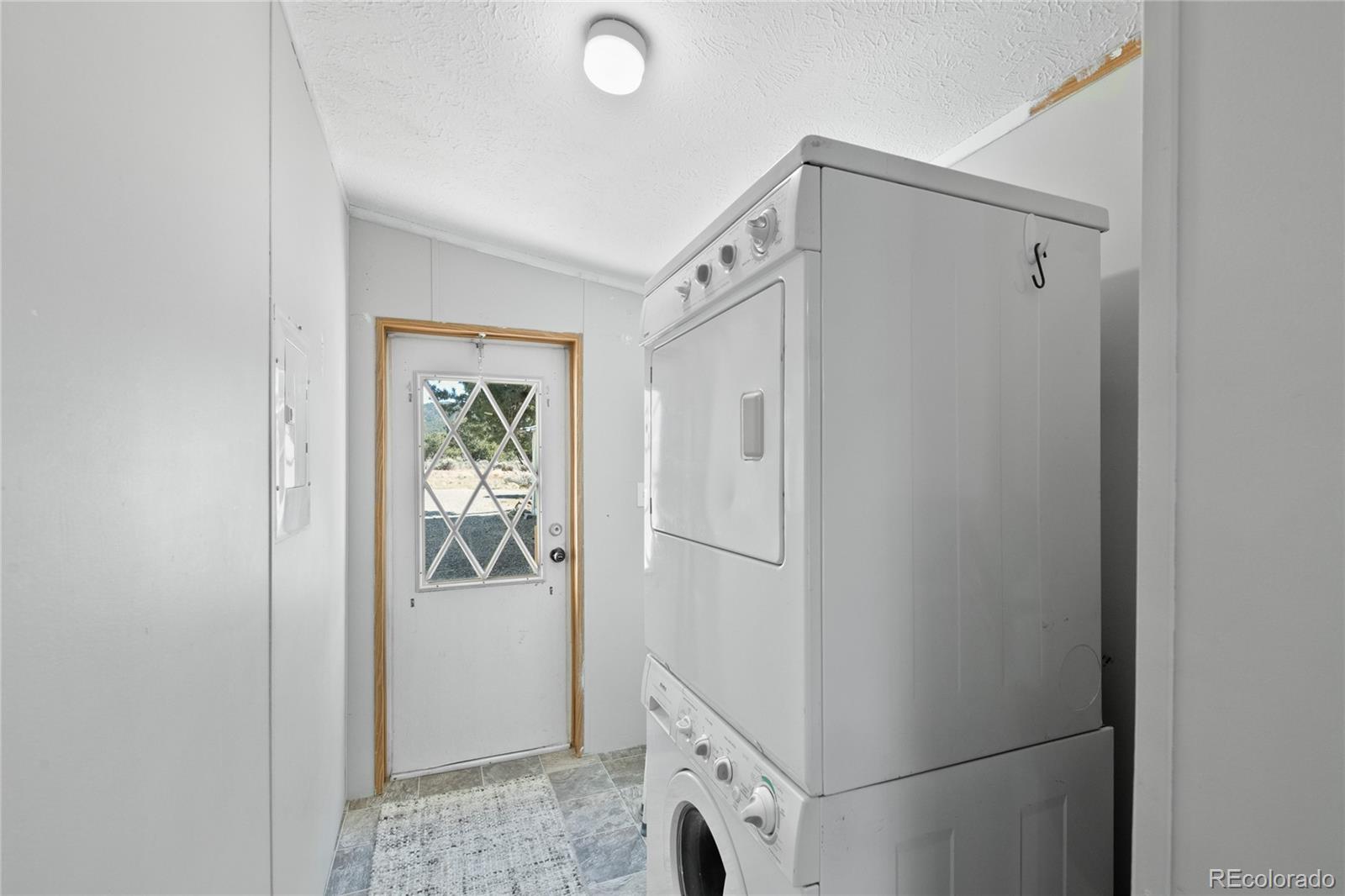 7027 Frelinghuysen Road Fort Garland, CO 81133 - Photo 22 of 47 a bathroom with a shower and a sink