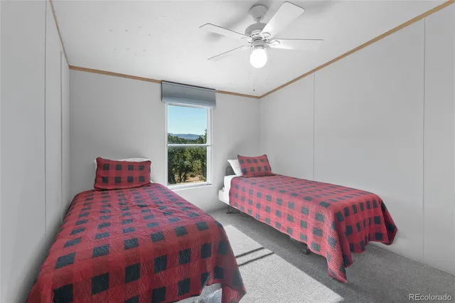 a bedroom with a bed and a closet