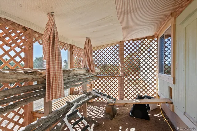 a view of a livingroom with furniture and windows