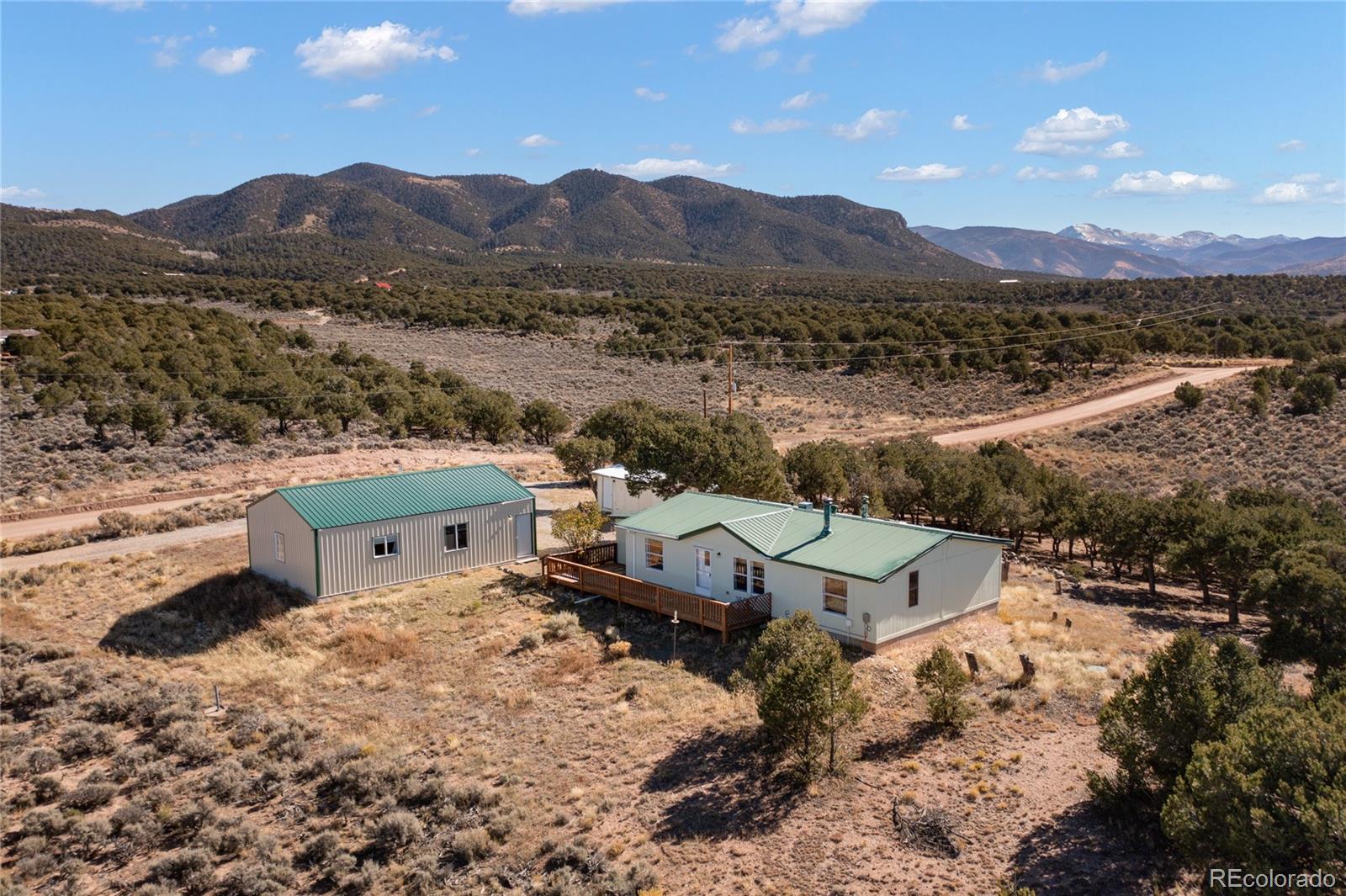 7027 Frelinghuysen Road Fort Garland, CO 81133 - Photo 8 of 47 a view of a terrace with a mountain