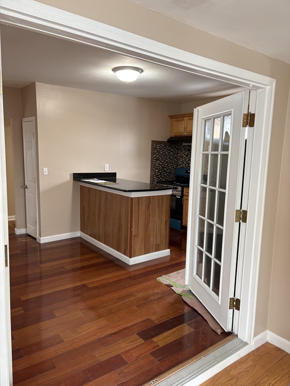 14 B School, Unit 2 Boston, MA 02124 - Photo 3 of 18 a view of a hardwood floor and staircase