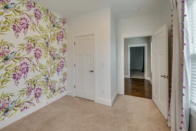 a view of a hallway with entryway