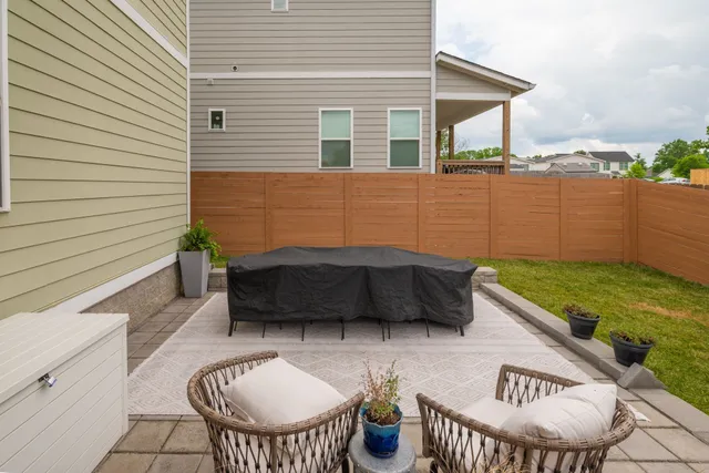 a view of a terrace with furniture