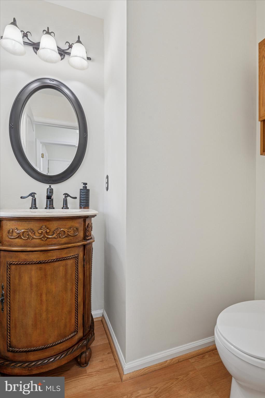 6 Crestpoint Drive New Castle, DE 19720 - Photo 16 of 36 a bathroom with a toilet mirror and vanity