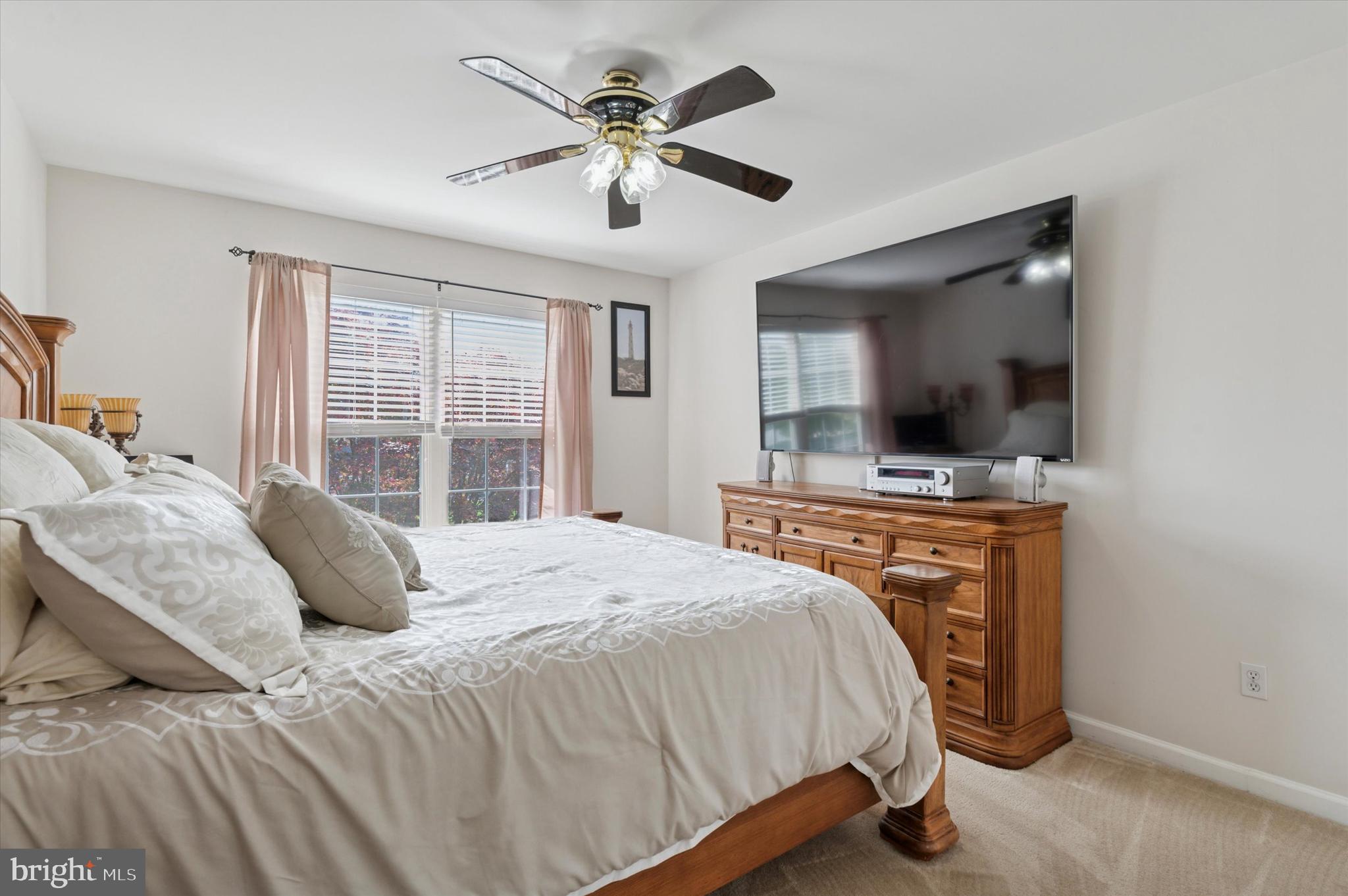 6 Crestpoint Drive New Castle, DE 19720 - Photo 19 of 36 a bedroom with a bed and a flat screen tv