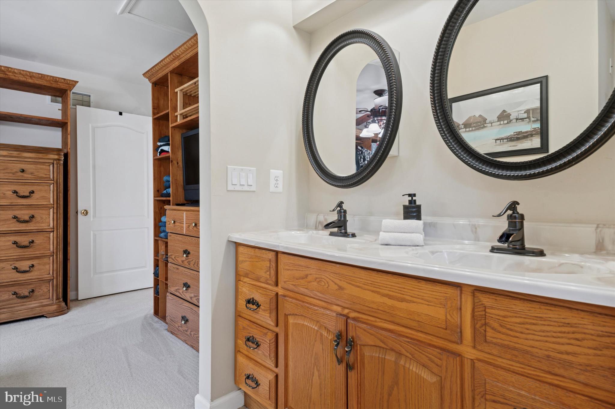 6 Crestpoint Drive New Castle, DE 19720 - Photo 22 of 36 a bathroom with a sink and a mirror