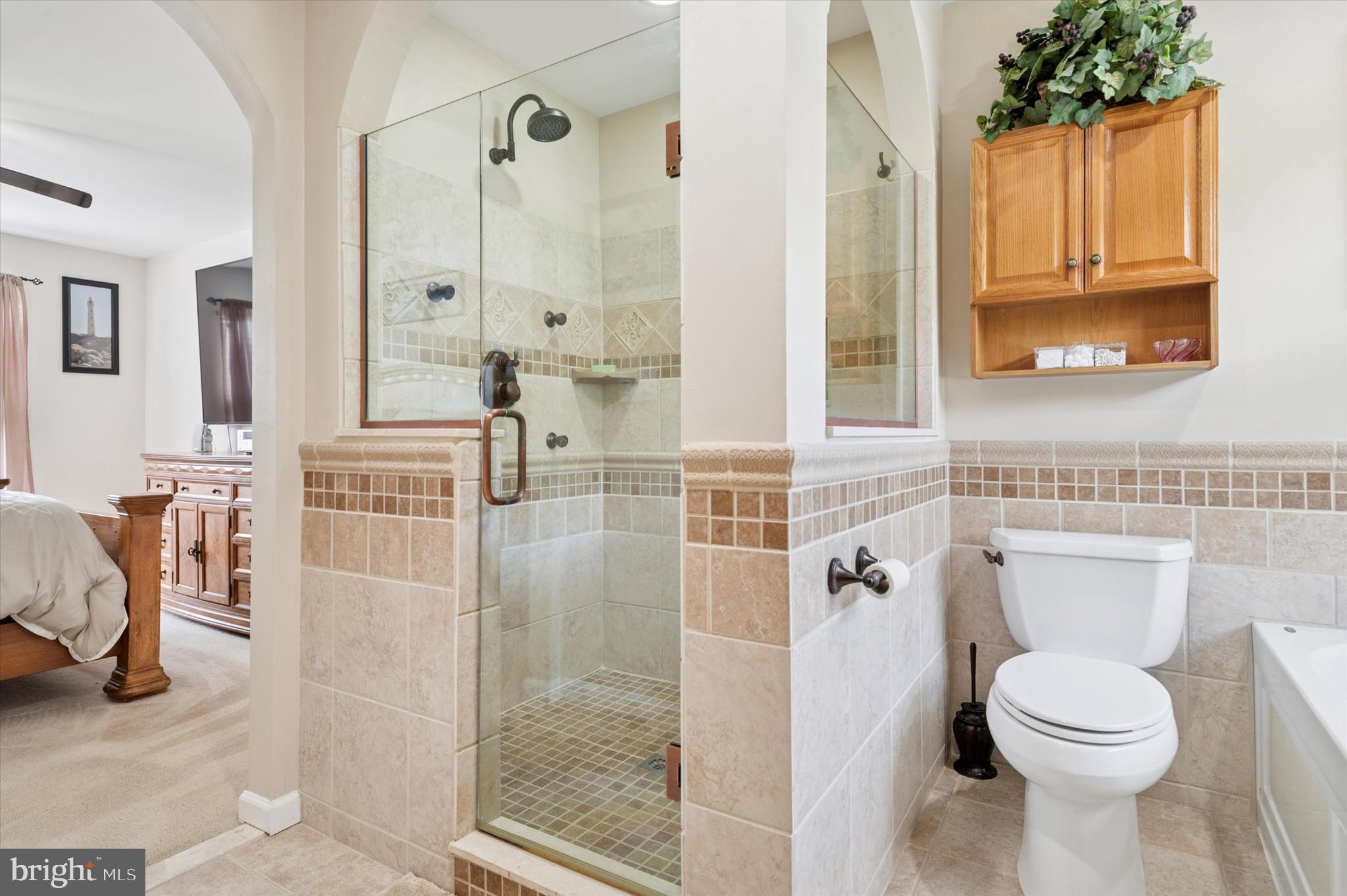 6 Crestpoint Drive New Castle, DE 19720 - Photo 23 of 36 a bathroom with a toilet a sink and shower