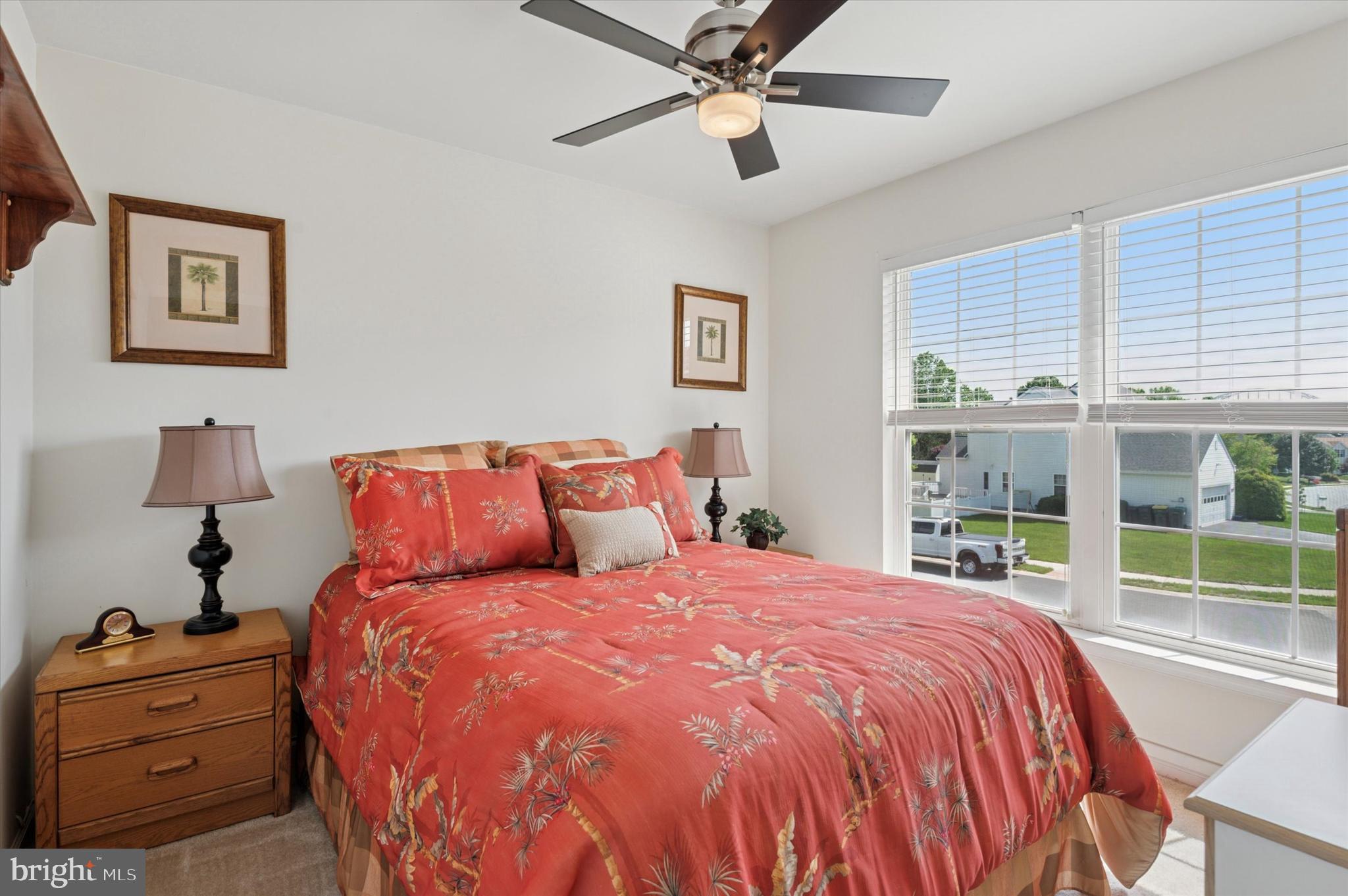 6 Crestpoint Drive New Castle, DE 19720 - Photo 27 of 36 a bed sitting in a bedroom next to a window