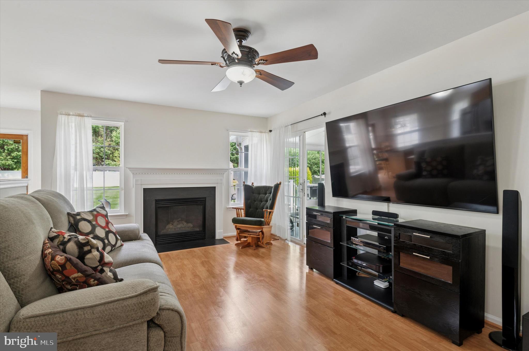 6 Crestpoint Drive New Castle, DE 19720 - Photo 3 of 36 a living room with furniture and a flat screen tv