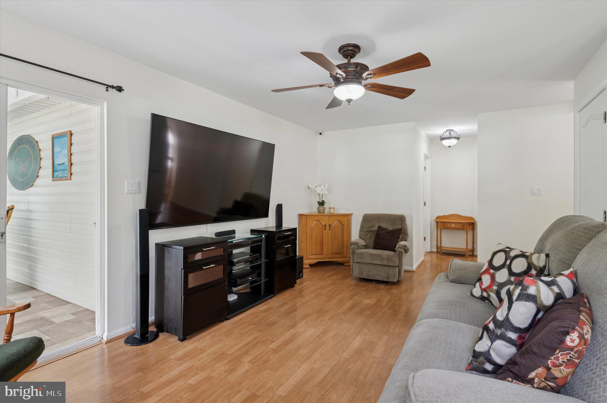6 Crestpoint Drive New Castle, DE 19720 - Photo 4 of 36 a living room with furniture and a flat screen tv