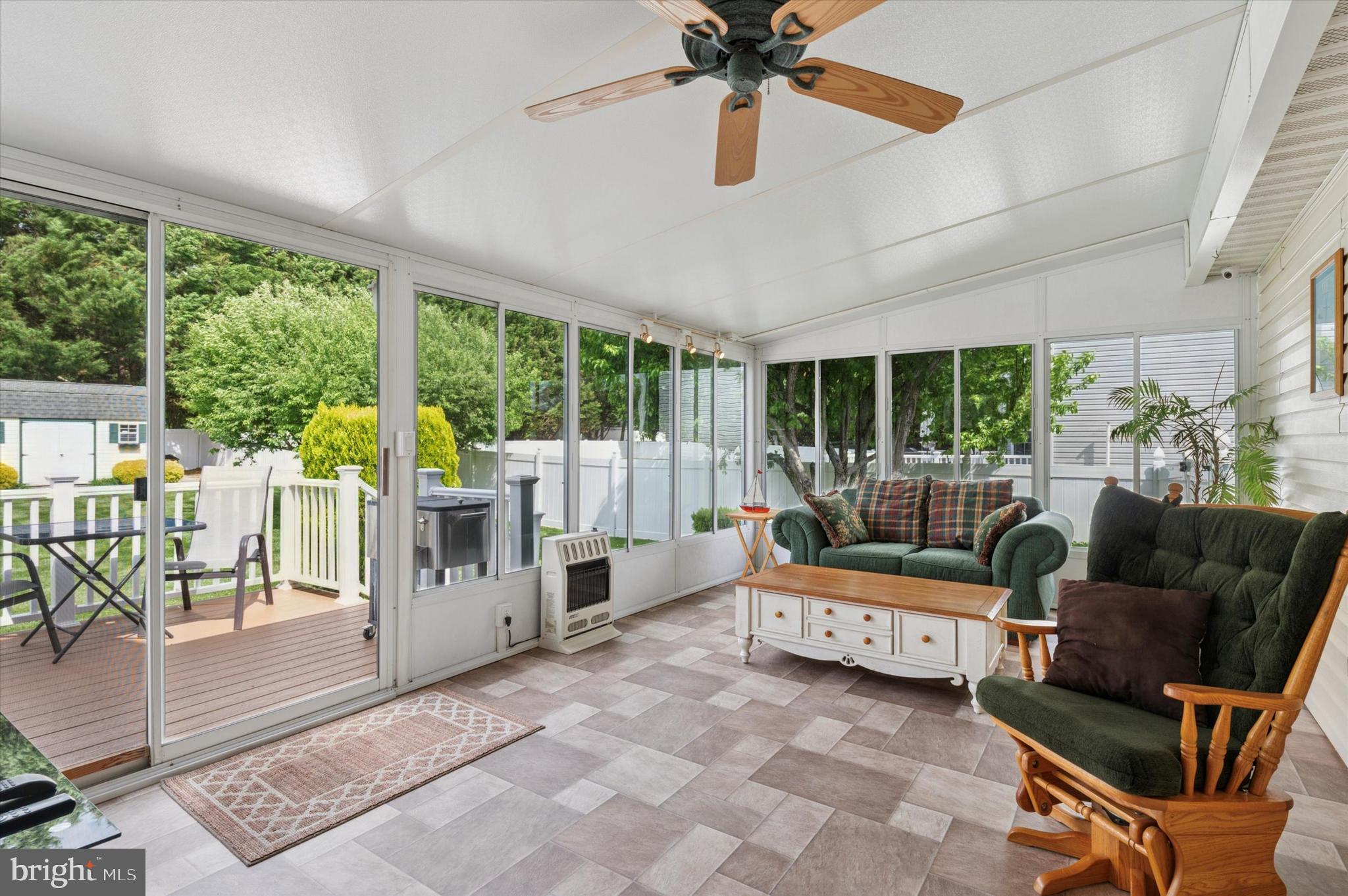 6 Crestpoint Drive New Castle, DE 19720 - Photo 5 of 36 a living room with furniture and a floor to ceiling window