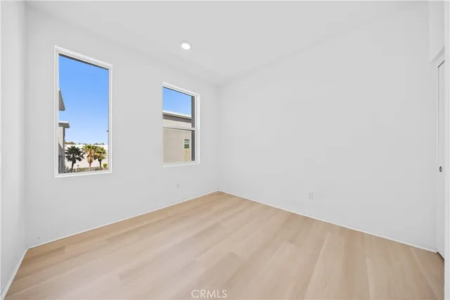 a view of empty room with windows