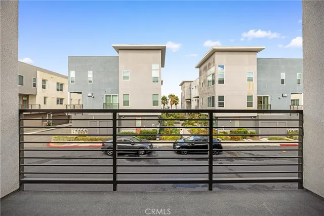 a bathroom with a shower sink vanity mirror and toilet