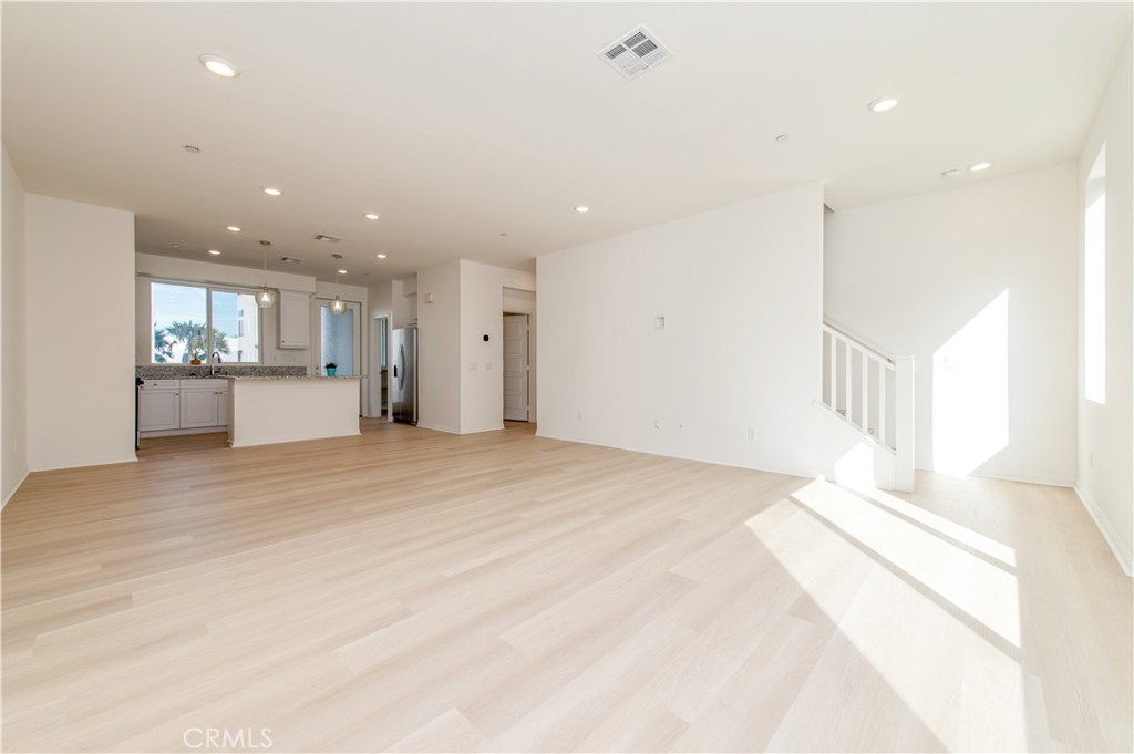 185 Steely Irvine, CA 92614 - Photo 24 of 35 a view of an empty room and a kitchen