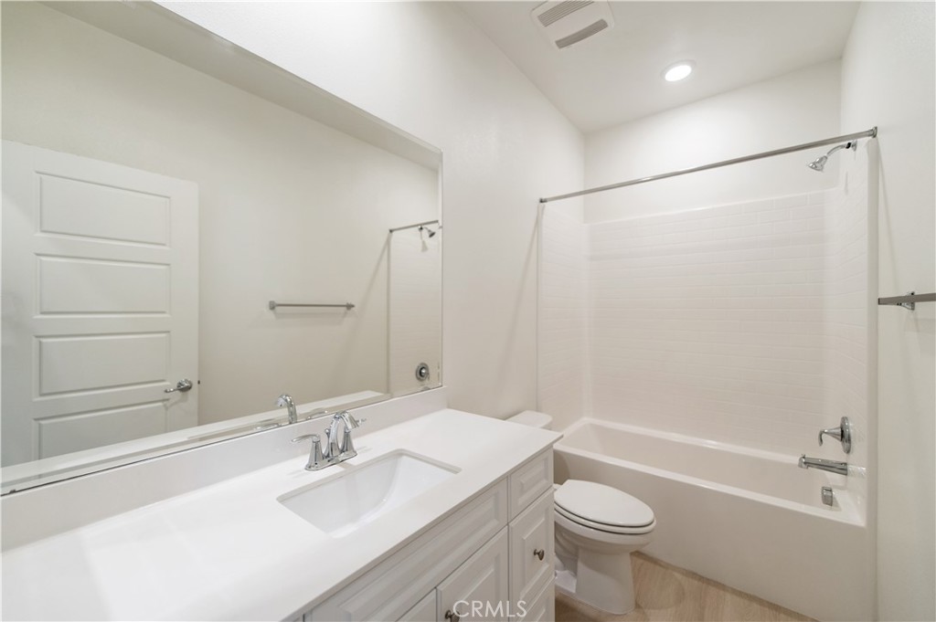 185 Steely Irvine, CA 92614 - Photo 30 of 35 a bathroom with a sink a toilet and shower