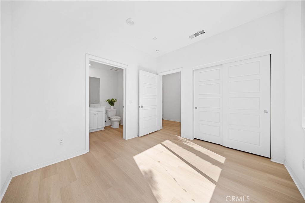 185 Steely Irvine, CA 92614 - Photo 4 of 35 a view of livingroom with white walls and window