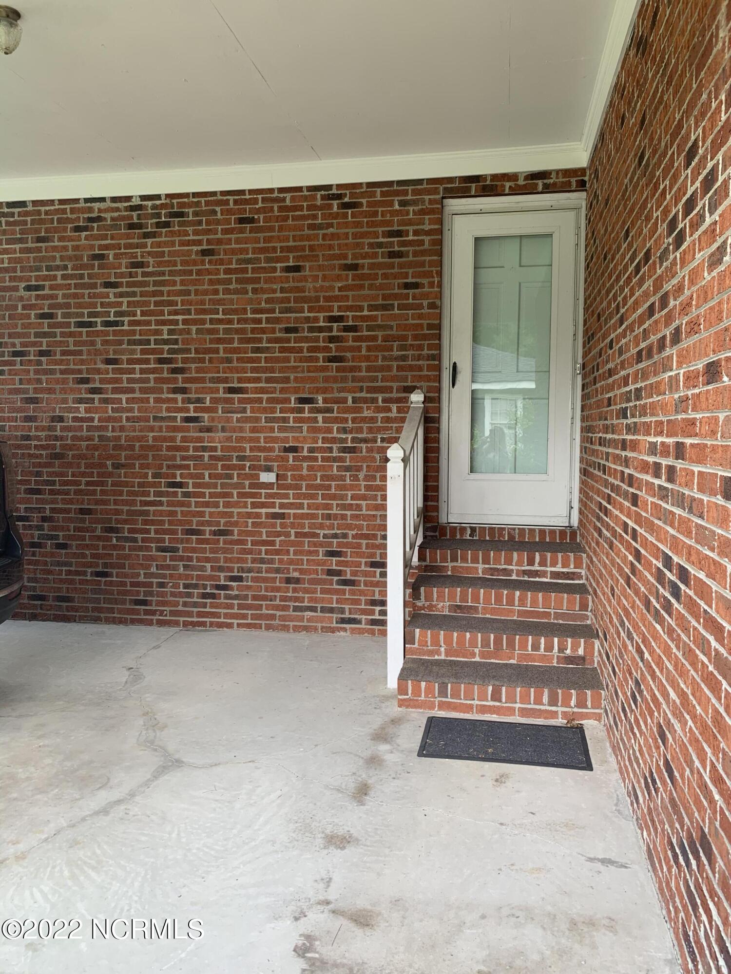 133 Ridge Road Newport, NC 28570 - Photo 24 of 26 Covered carport with side entry