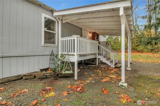 a backyard of a house with garden