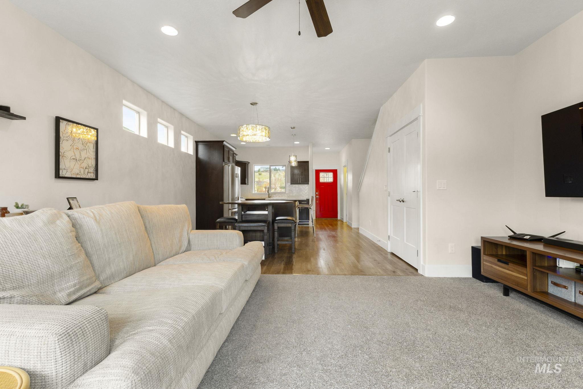 18293 North Streams Edge Way Boise, ID 83714 - Photo 10 of 50 Carpeted living area with ceiling fan and recessed lighting